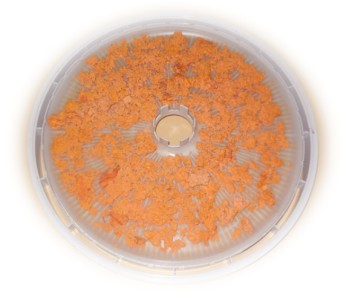 Dehydrator tray of grated carrot pulp
